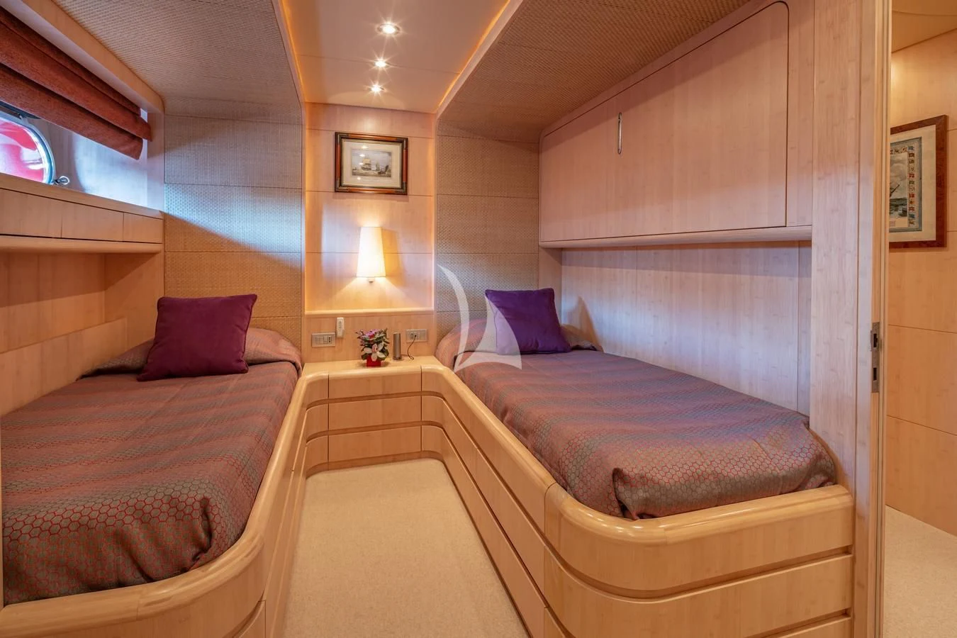 a room with two beds aboard GLAROS Yacht for Sale