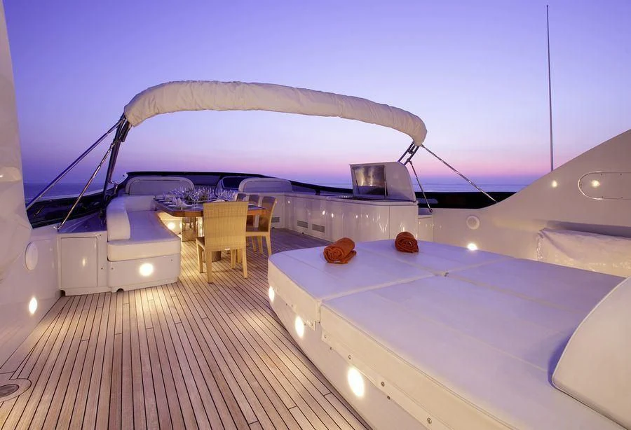 a large boat on a trailer aboard GLAROS Yacht for Sale