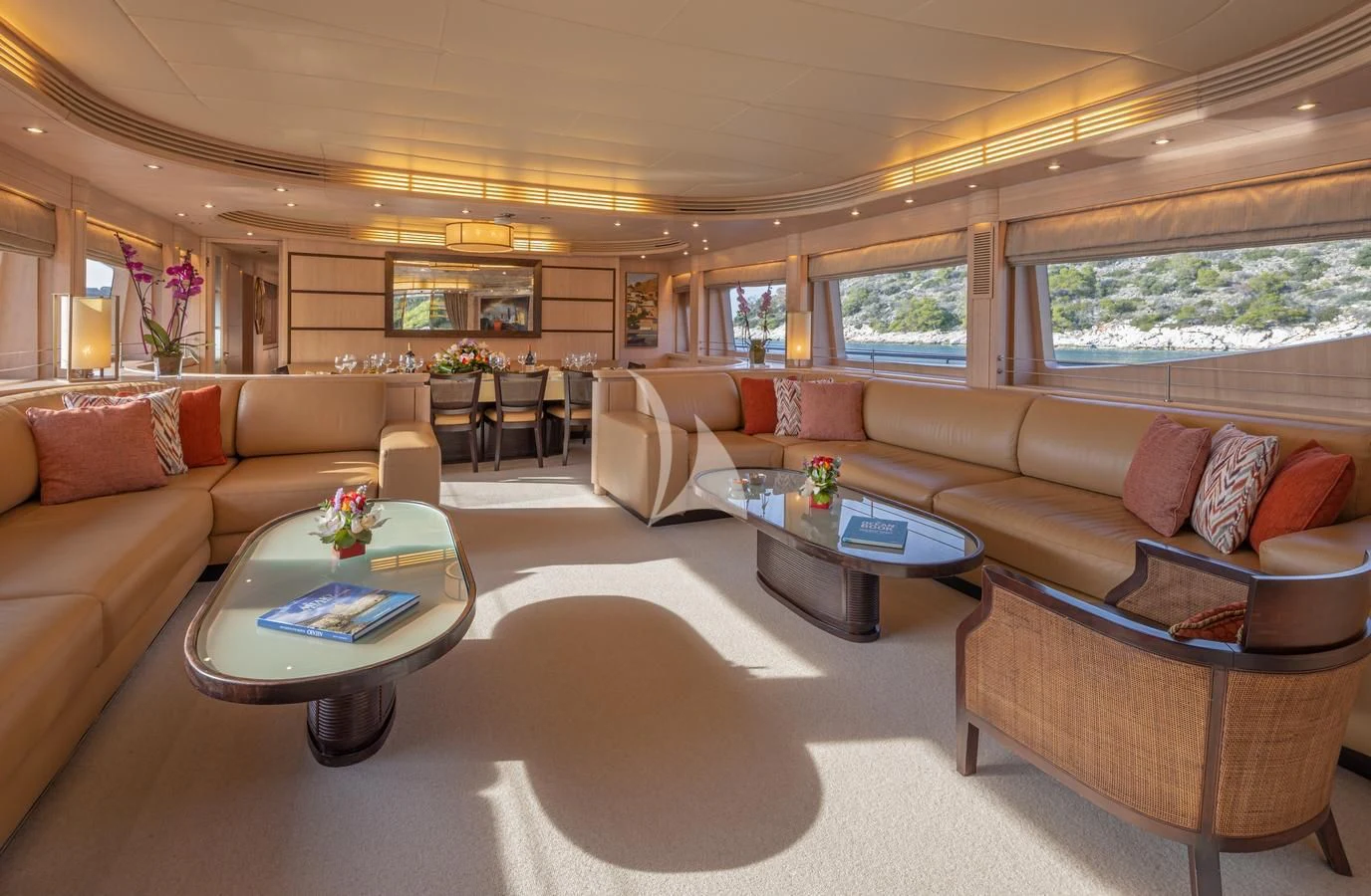 a living room with a couch and a coffee table aboard GLAROS Yacht for Sale