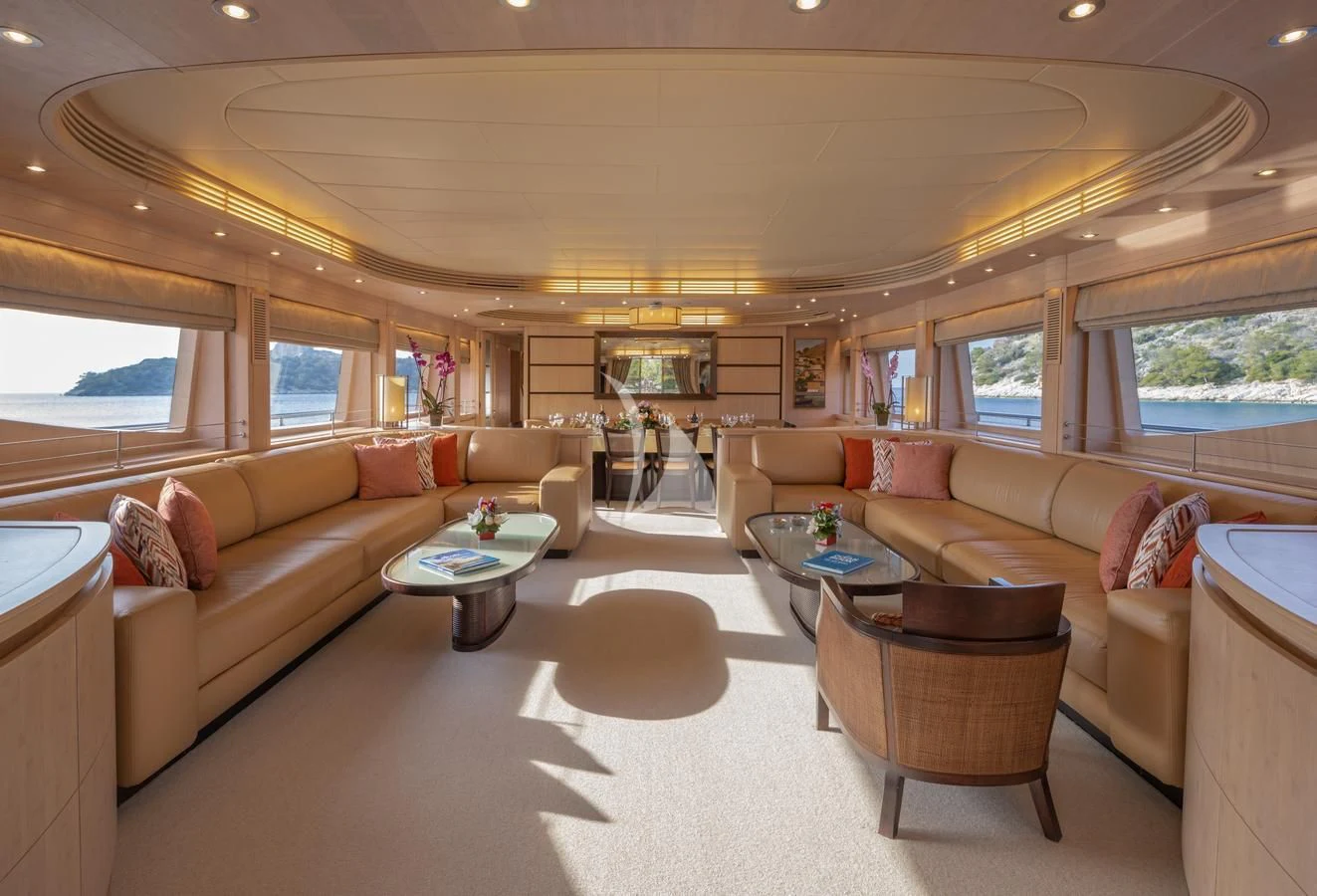 a living room with a couch and a coffee table aboard GLAROS Yacht for Sale