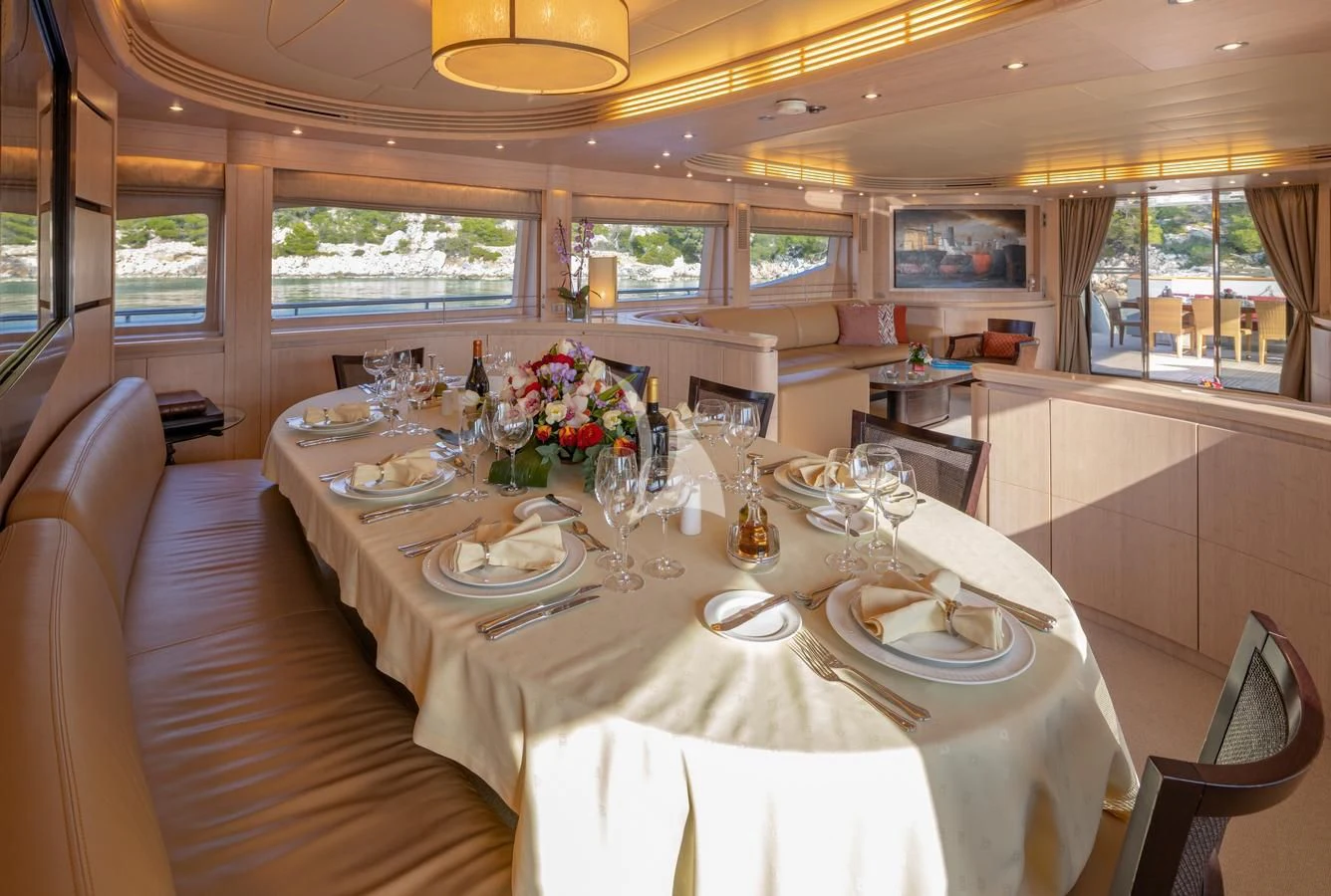 a table set for a dinner aboard GLAROS Yacht for Sale