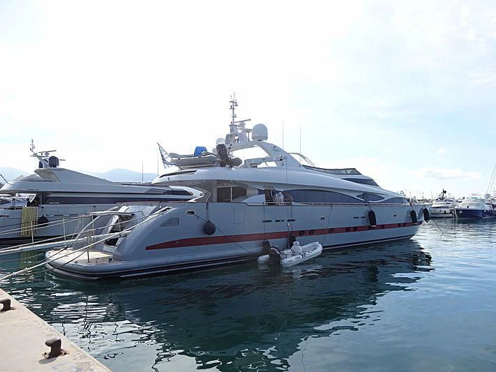 a boat docked at a pier aboard GLAROS Yacht for Sale