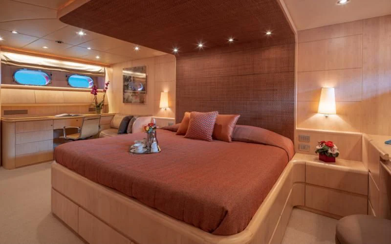 a bed with a large bed aboard GLAROS Yacht for Sale