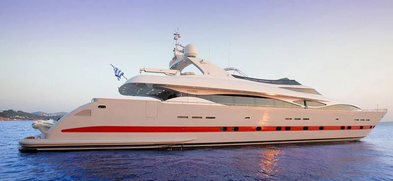 a white yacht on the water aboard GLAROS Yacht for Sale