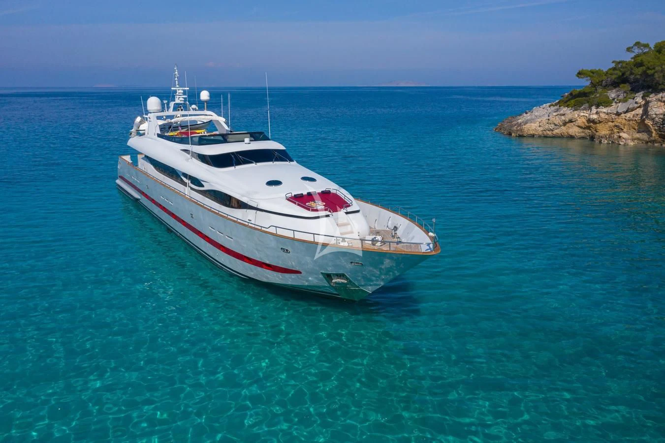 a white boat in the water aboard GLAROS Yacht for Sale