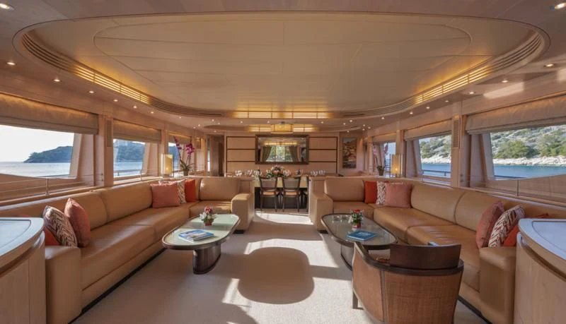 a living room with a large window aboard GLAROS Yacht for Sale
