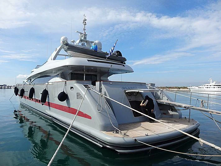 a boat docked at a pier aboard GLAROS Yacht for Sale