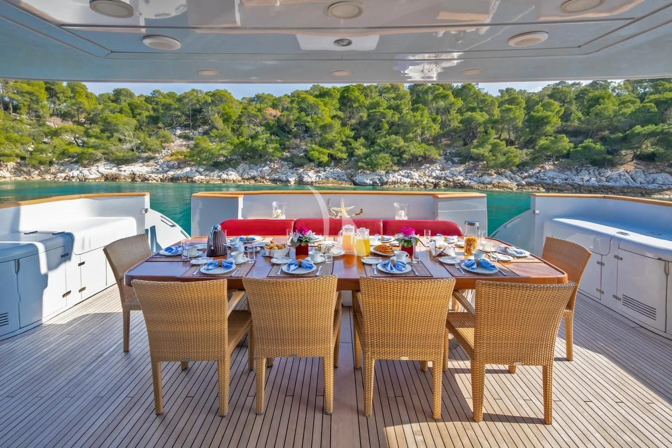 a table set for a meal aboard GLAROS Yacht for Sale