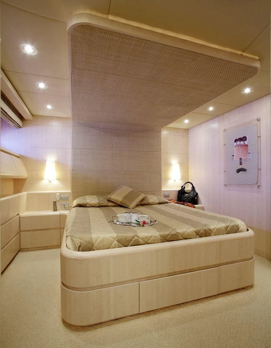 a bed in a room aboard GLAROS Yacht for Sale
