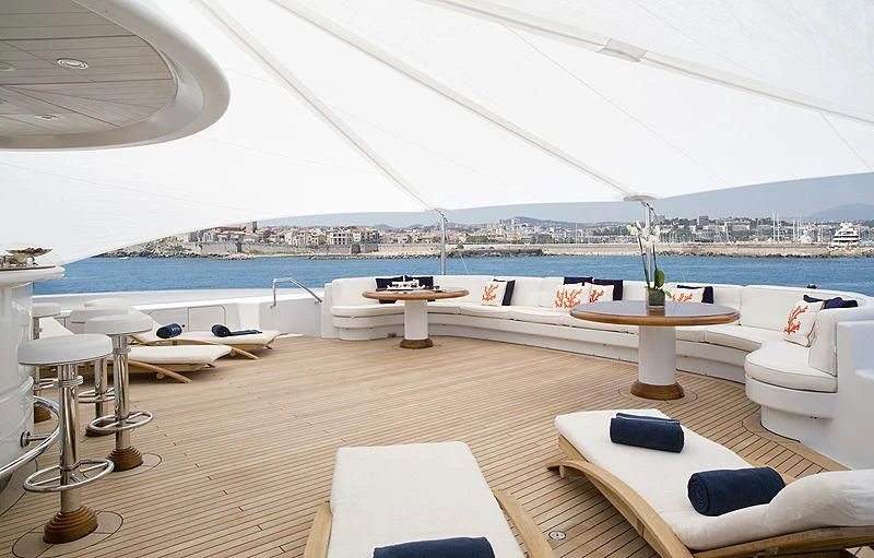 a room with a table and chairs aboard SARAH Yacht for Sale