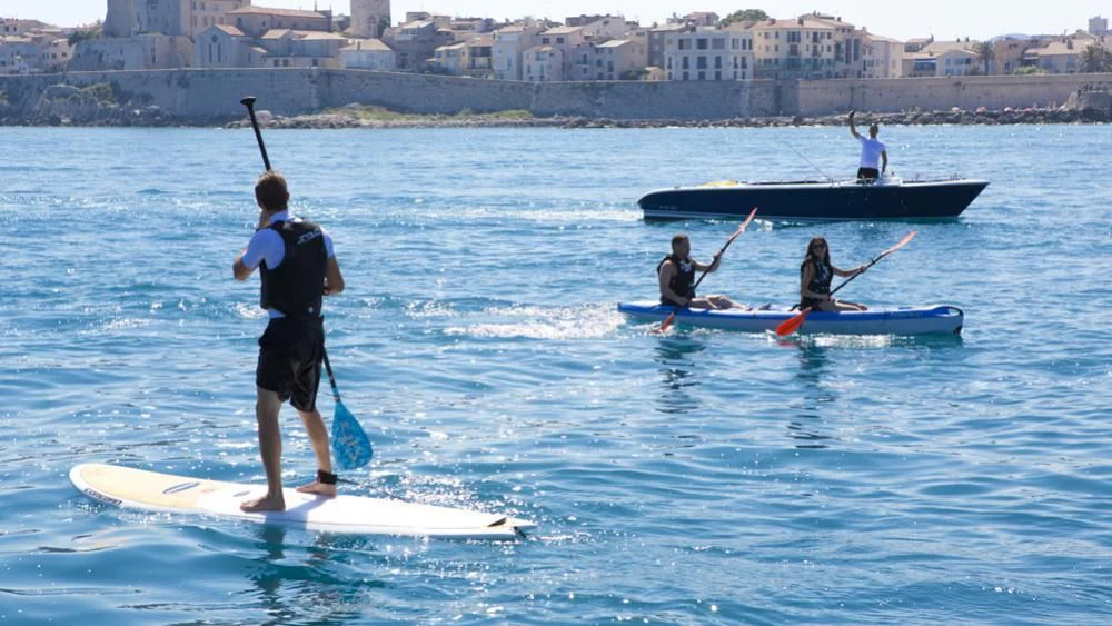 a group of people on surfboards in the water aboard SARAH Yacht for Sale