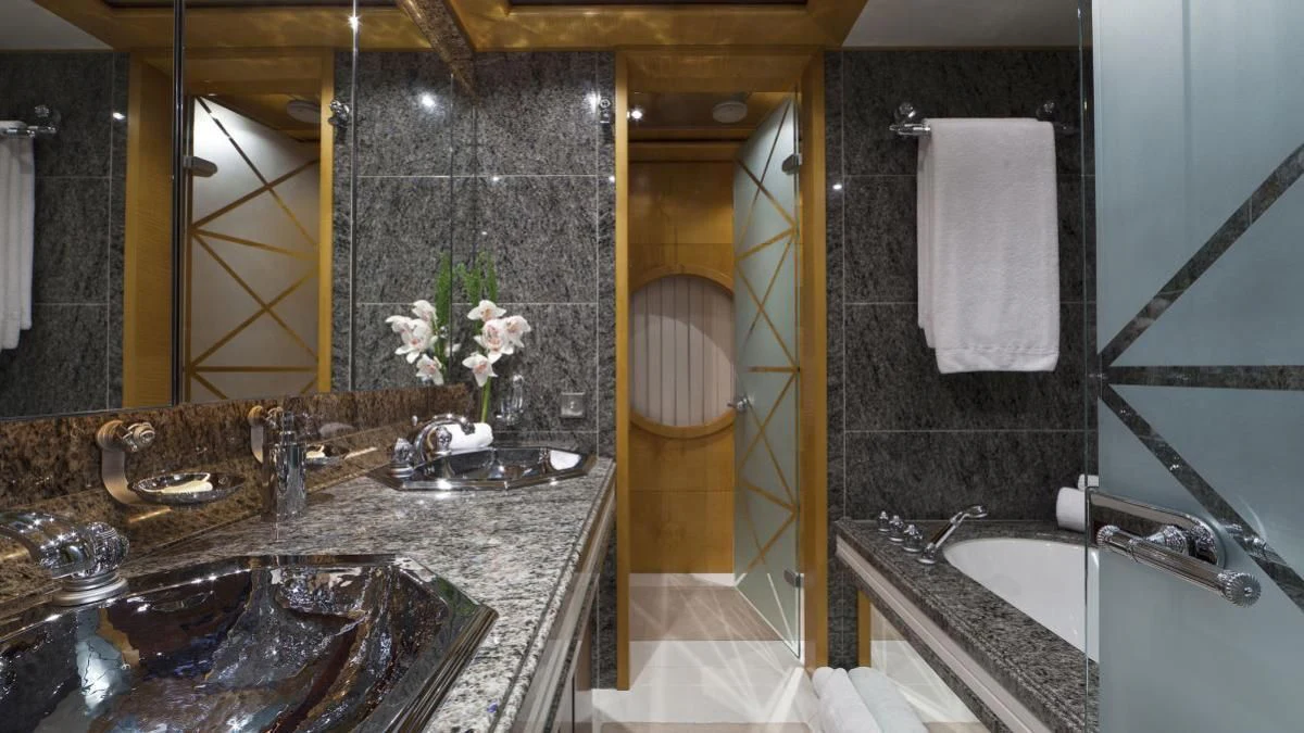 a bathroom with a marble countertop aboard SARAH Yacht for Sale