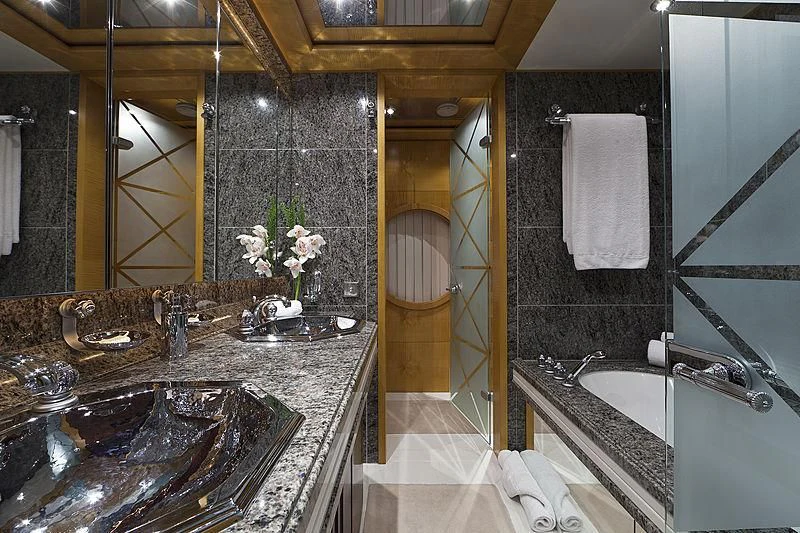 a bathroom with a marble countertop aboard SARAH Yacht for Sale