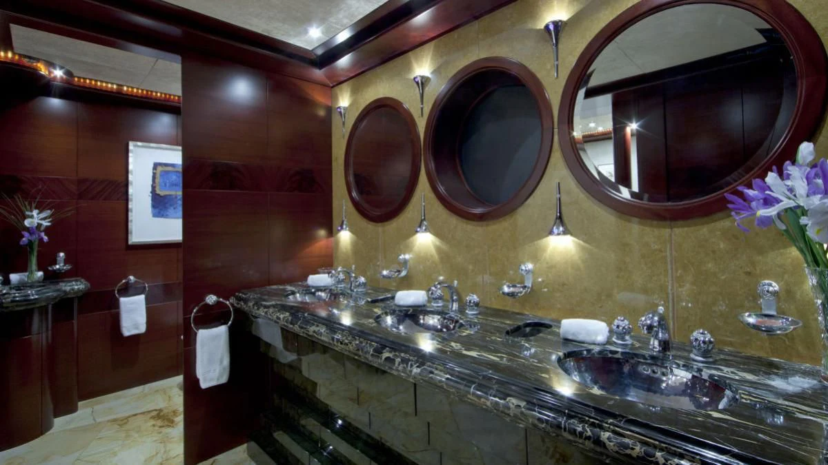 a large bathroom with a large mirror aboard SARAH Yacht for Sale