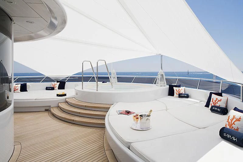 a white room with a white table and chairs aboard SARAH Yacht for Sale