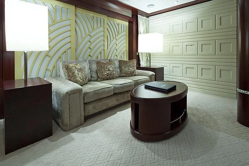 a living room with a couch and a table aboard SARAH Yacht for Sale