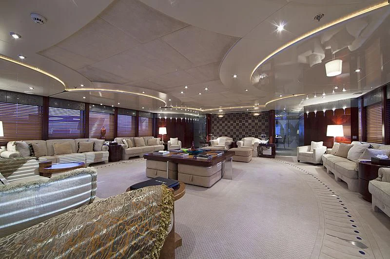 a large living room with a large screen aboard SARAH Yacht for Sale