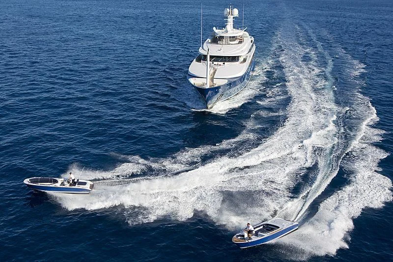 a boat and a couple of boats in the water aboard SARAH Yacht for Sale