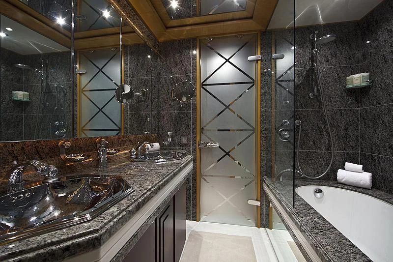 a bathroom with a large marble countertop aboard SARAH Yacht for Sale