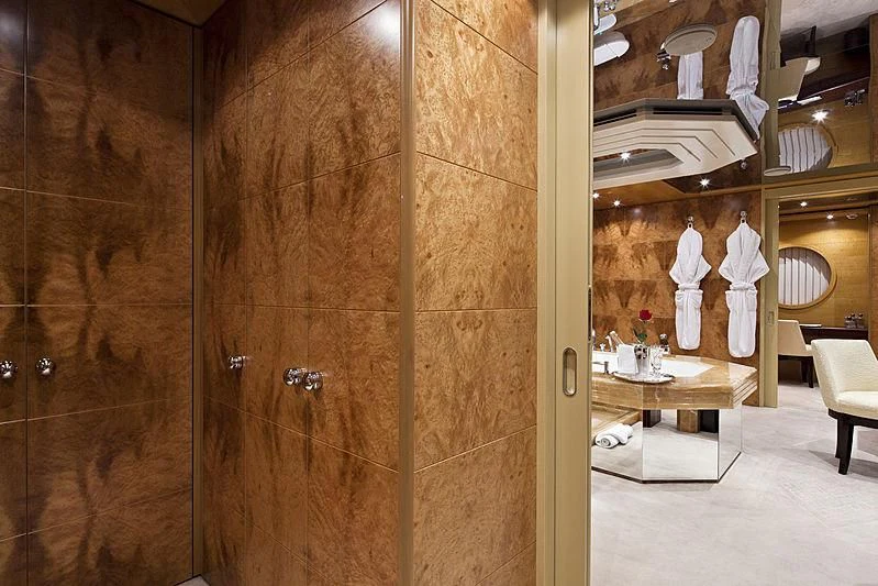 a bathroom with wooden cabinets aboard SARAH Yacht for Sale