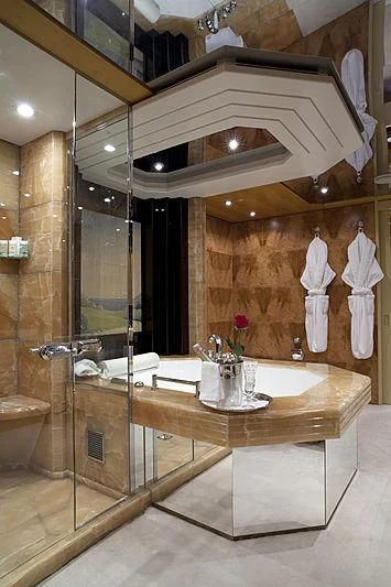 a bathroom with a large mirror aboard SARAH Yacht for Sale