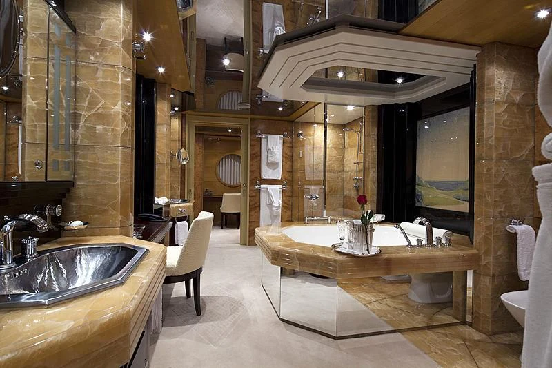 a bathroom with a large mirror aboard SARAH Yacht for Sale