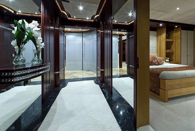 a room with a bed and a table aboard SARAH Yacht for Sale