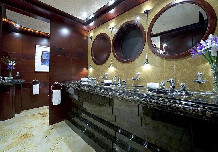 a large bathroom with a large marble countertop aboard SARAH Yacht for Sale