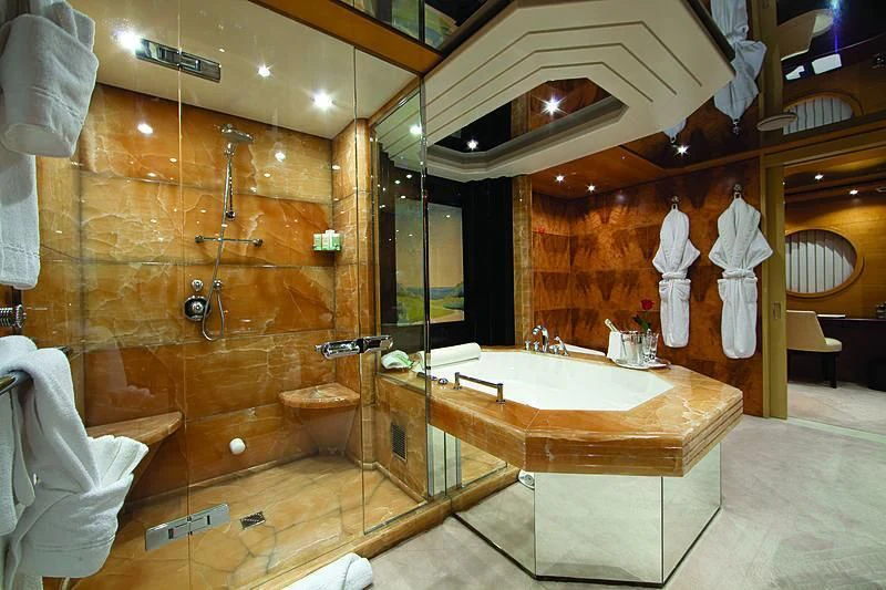 a bathroom with a large mirror aboard SARAH Yacht for Sale