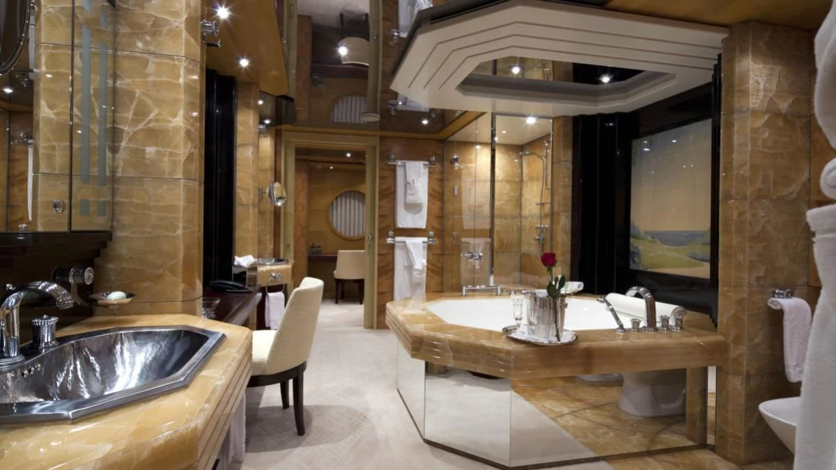 a bathroom with a large mirror aboard SARAH Yacht for Sale
