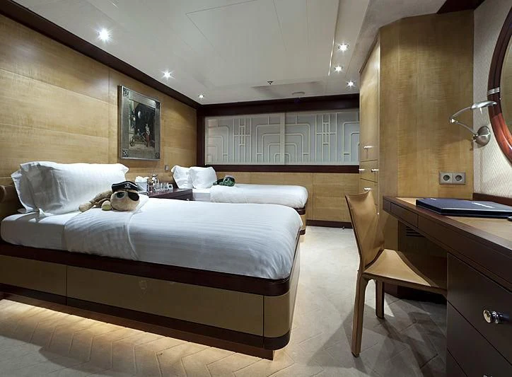 a room with a bed and a desk aboard SARAH Yacht for Sale