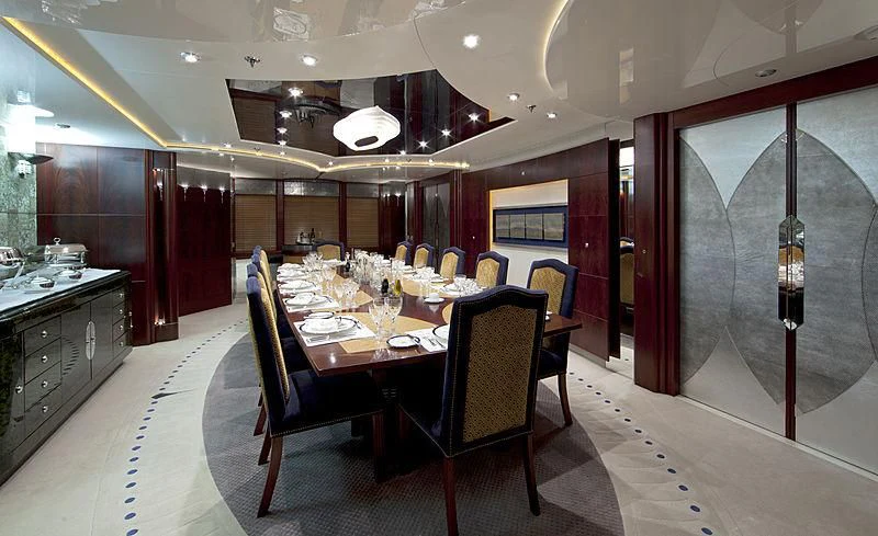 a large kitchen with a dining table aboard SARAH Yacht for Sale