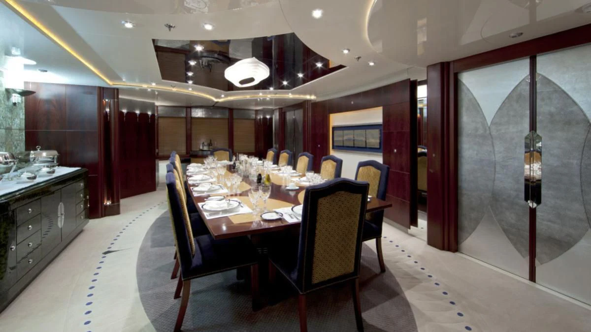 a large kitchen with a dining table aboard SARAH Yacht for Sale