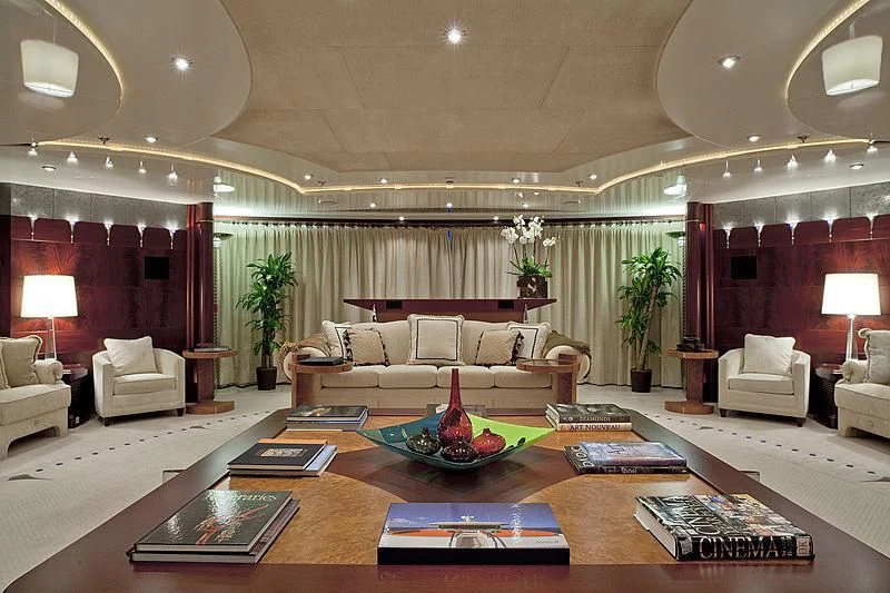 a living room with a couch and a coffee table aboard SARAH Yacht for Sale
