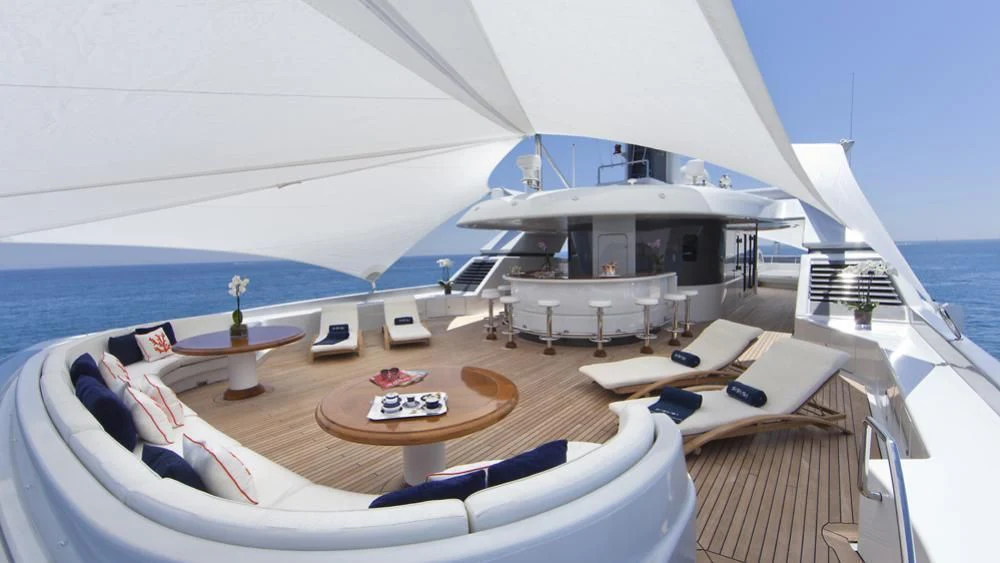 a large white boat on a large body of water aboard SARAH Yacht for Sale