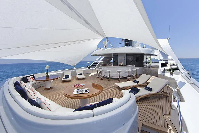 a large white boat on a body of water aboard SARAH Yacht for Sale