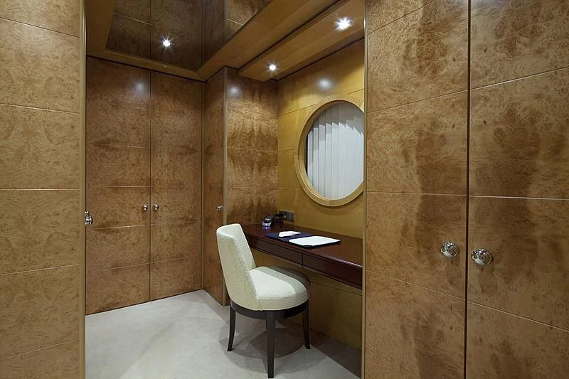 a bathroom with a mirror and a sink aboard SARAH Yacht for Sale