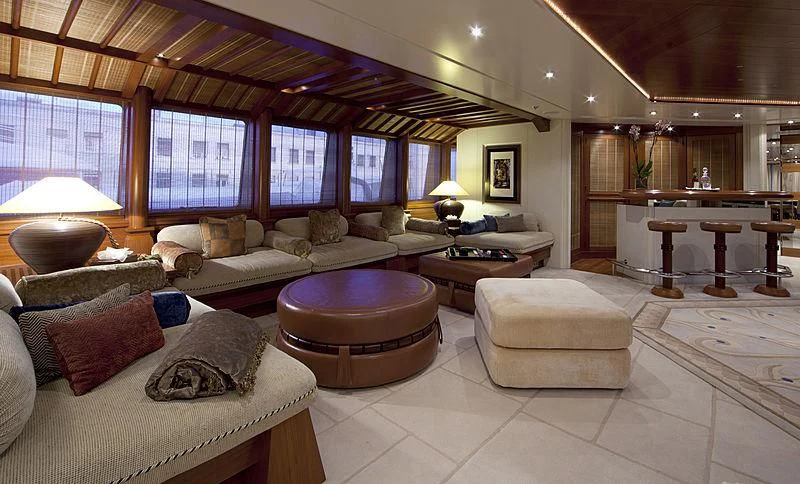 a living room with a large window aboard SARAH Yacht for Sale