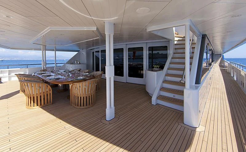 a room with a table and chairs aboard SARAH Yacht for Sale