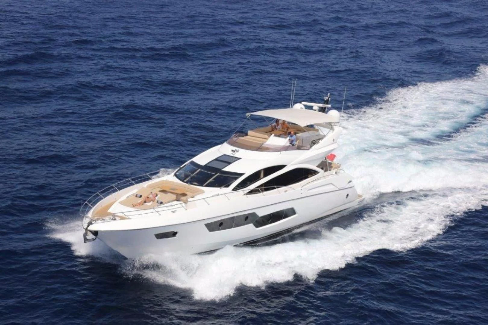 a white yacht on the water aboard YINWA Yacht for Sale