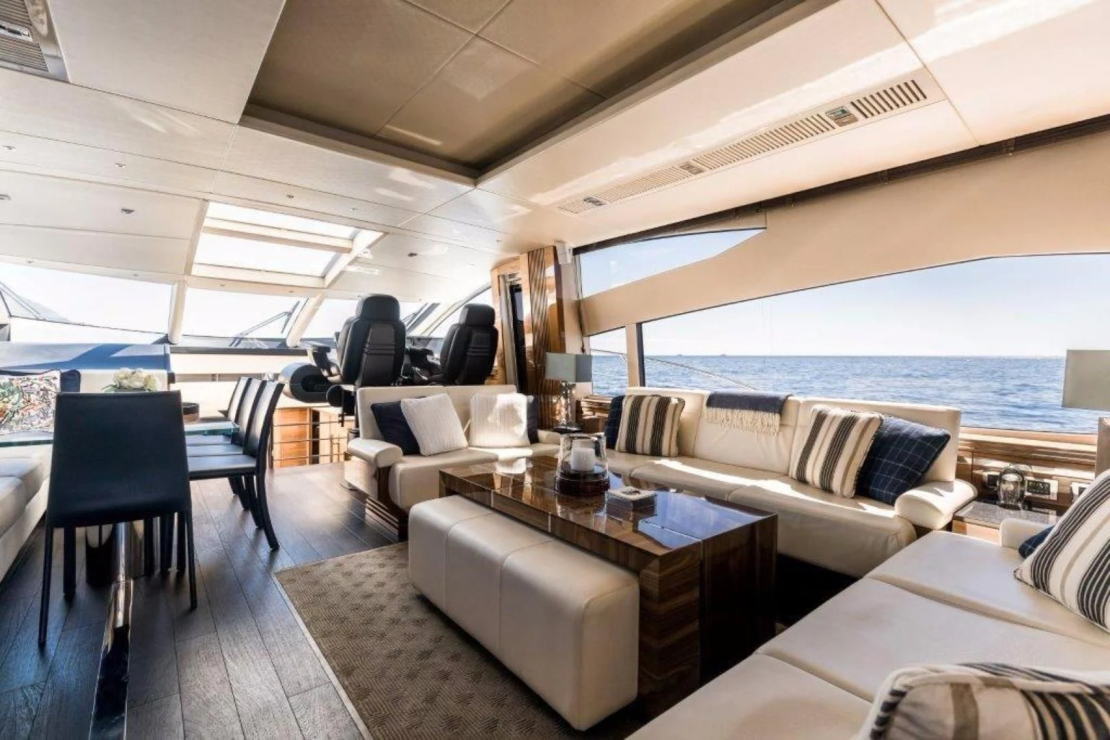 a large living room with a large balcony aboard YINWA Yacht for Sale