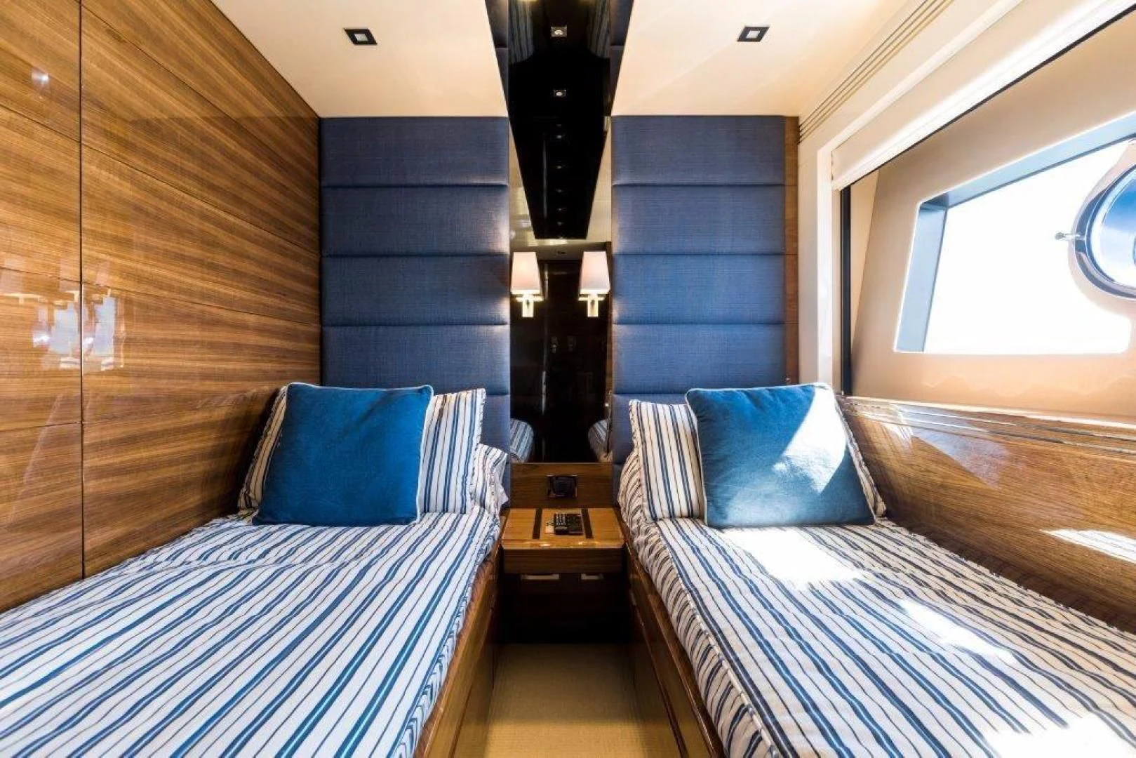 a room with two beds aboard YINWA Yacht for Sale