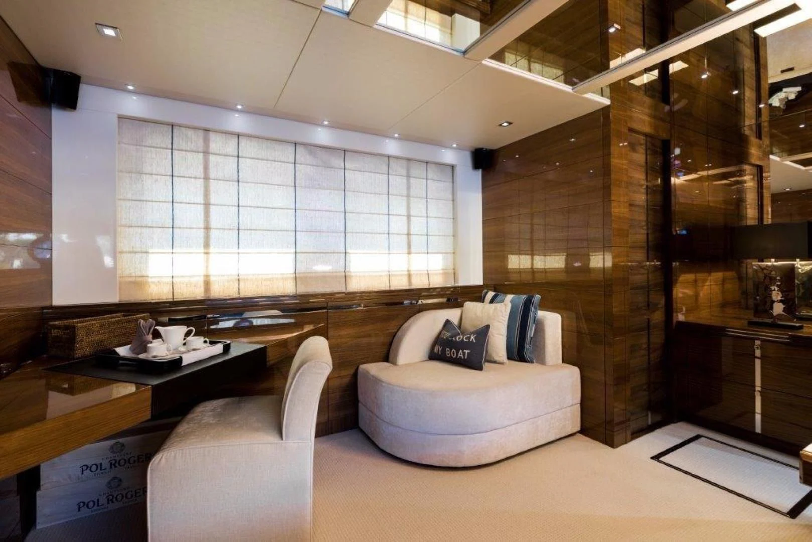 a room with a couch and a table aboard YINWA Yacht for Sale