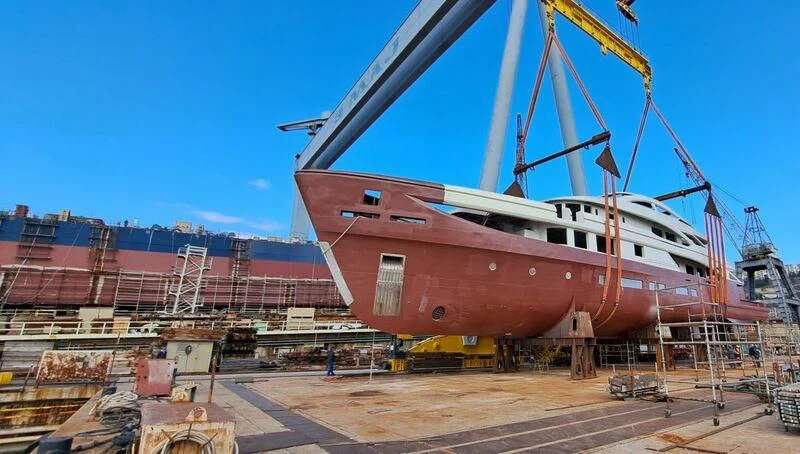 a large white ship aboard ASANI Yacht for Sale