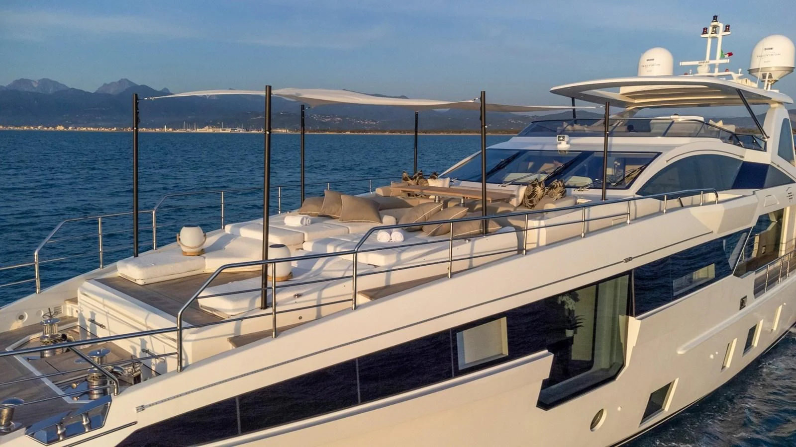 a boat on the water aboard AZIMUT GRANDE 32M Yacht for Sale
