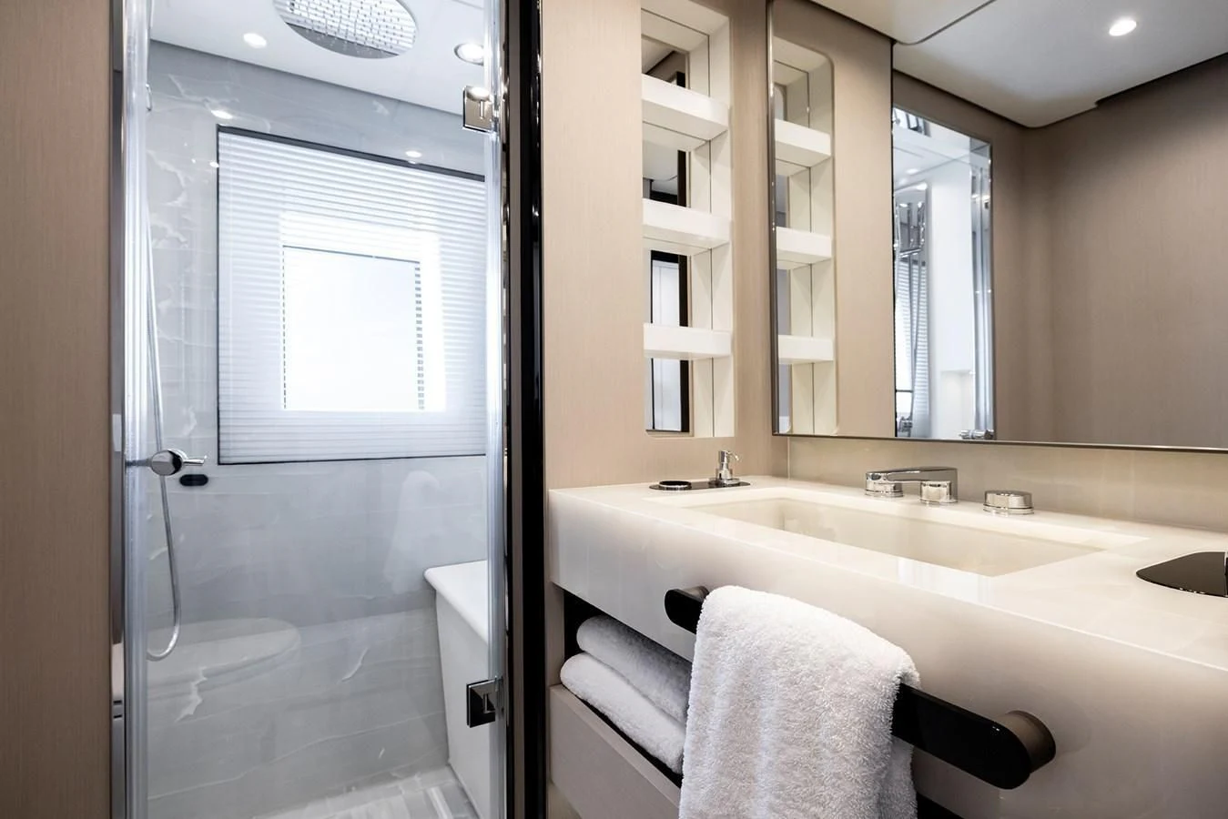 a bathroom with a bathtub and sink aboard AZIMUT GRANDE 32M Yacht for Sale