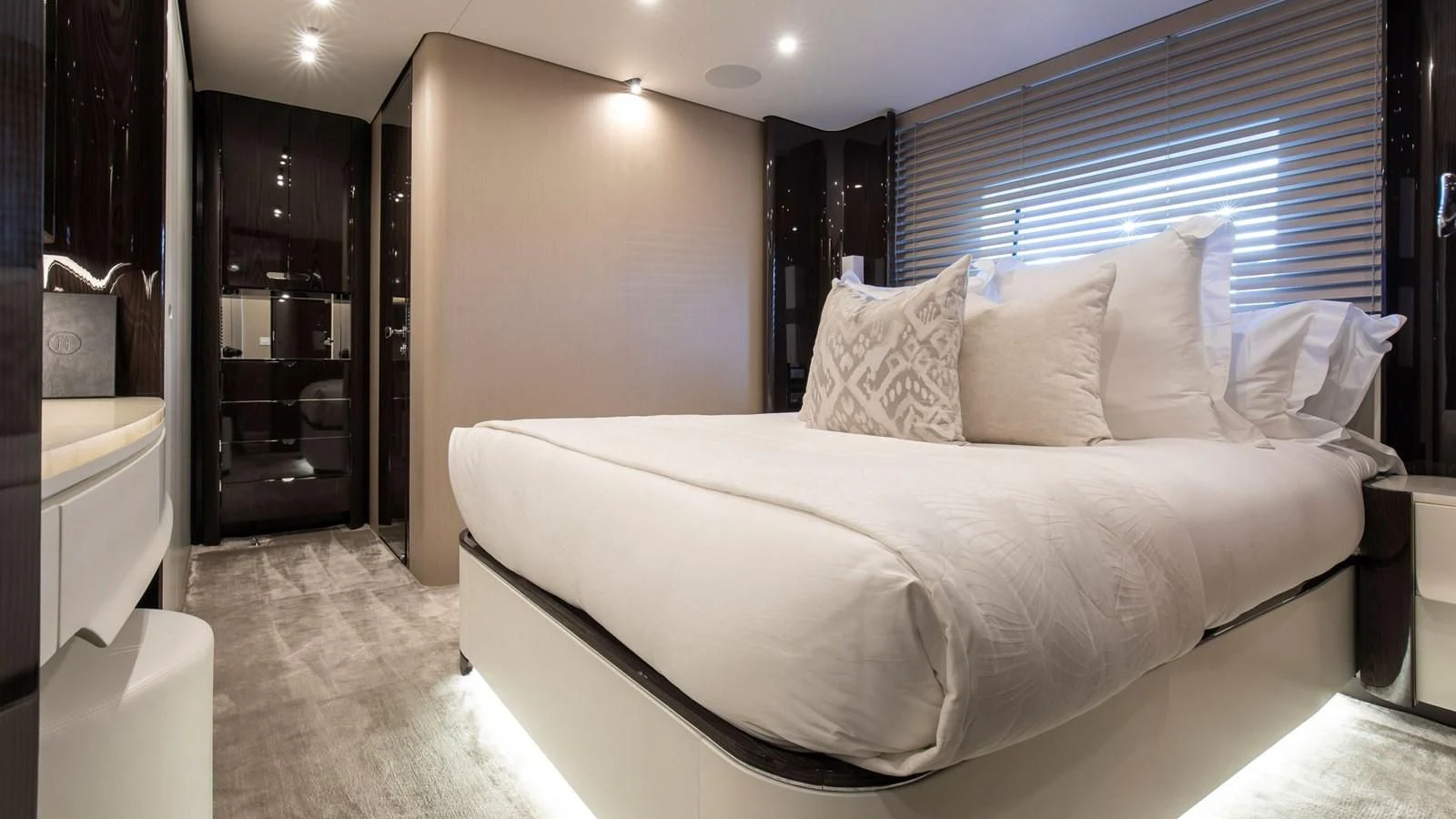 a bed in a hotel room aboard AZIMUT GRANDE 32M Yacht for Sale