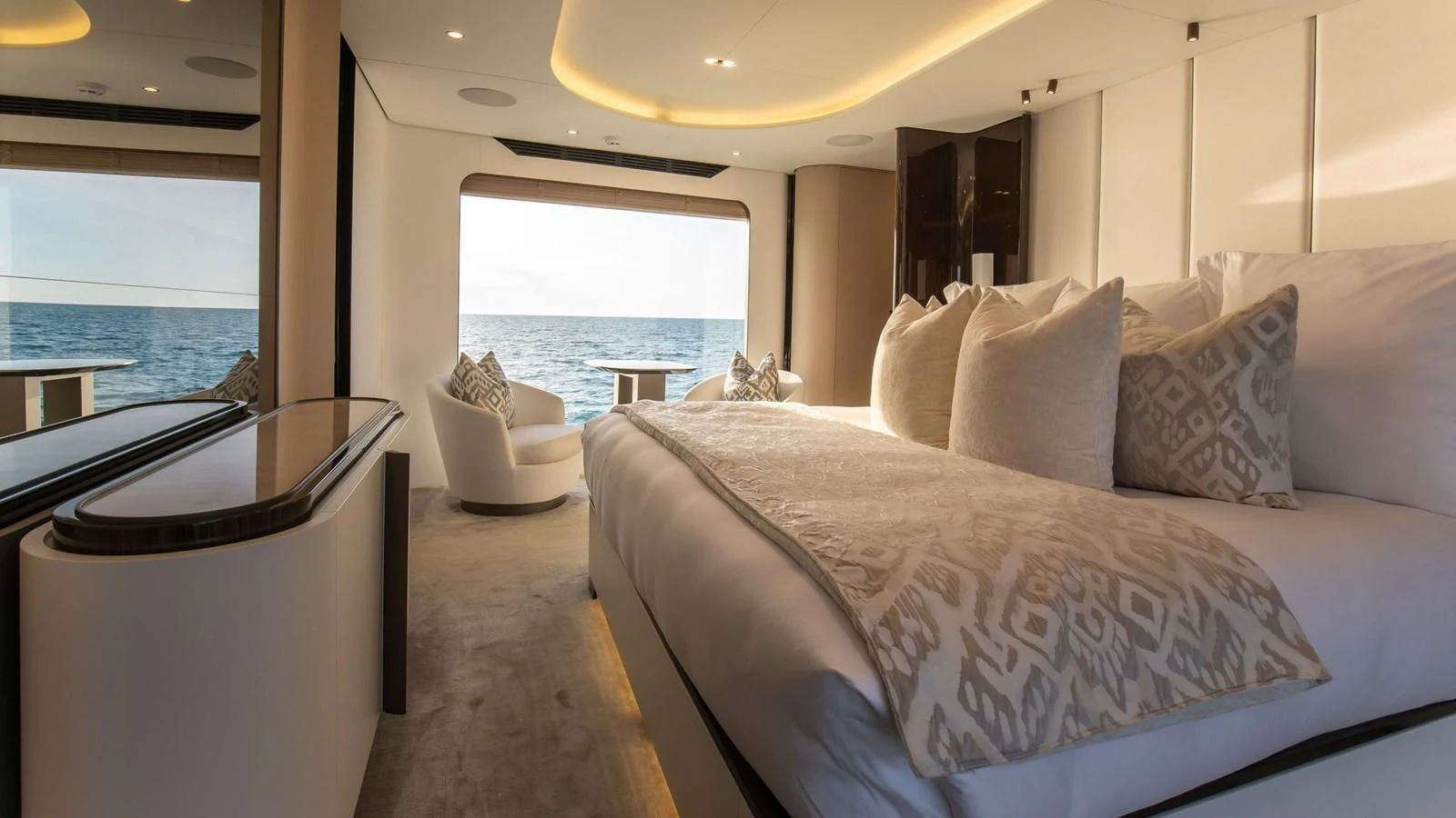 a bed with pillows on it aboard AZIMUT GRANDE 32M Yacht for Sale