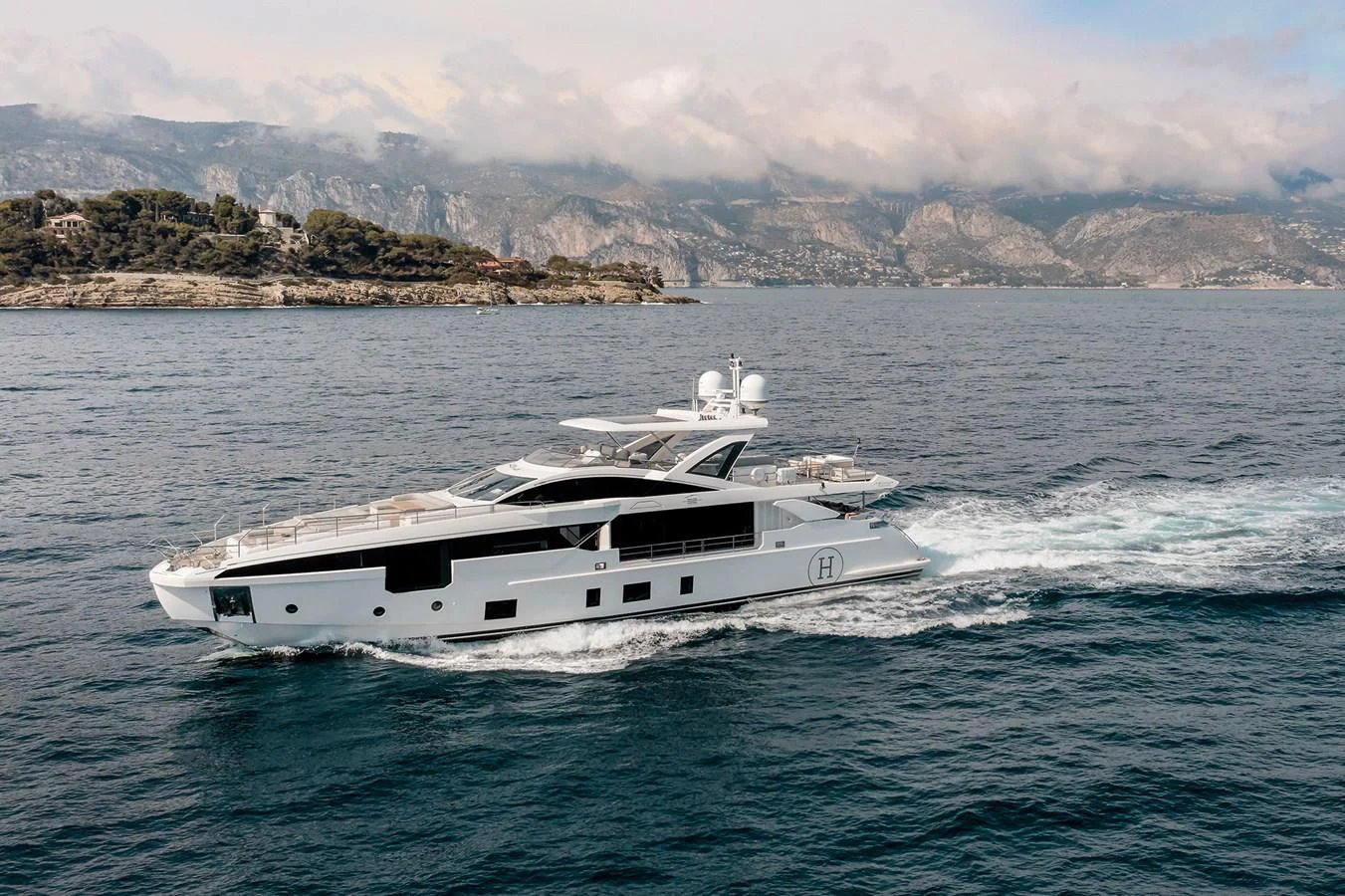 a white yacht in the water aboard AZIMUT GRANDE 32M Yacht for Sale