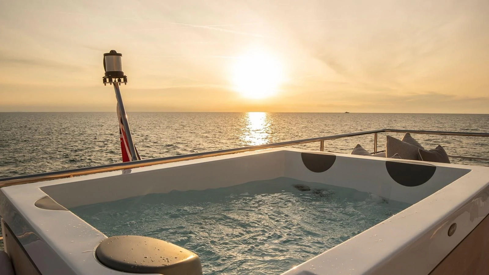 the sun setting over the ocean aboard AZIMUT GRANDE 32M Yacht for Sale